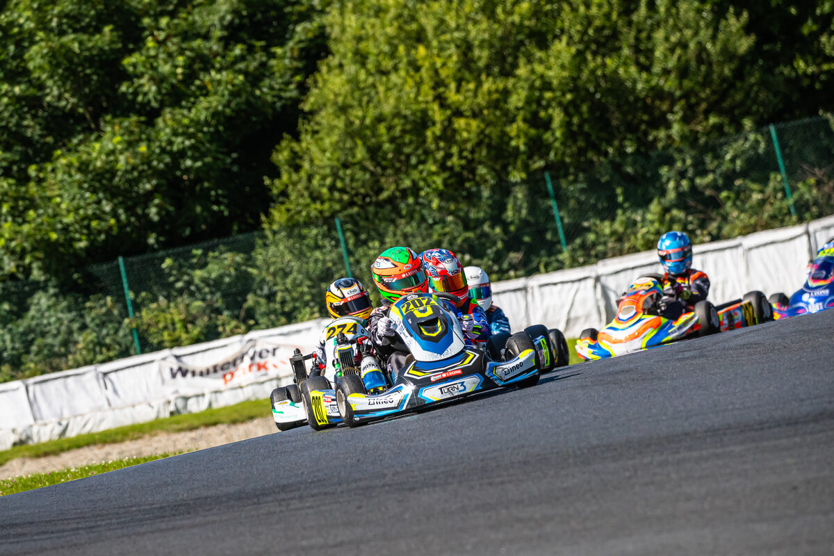 Oliver Meredith racing wheel-to-wheel through a fast corner